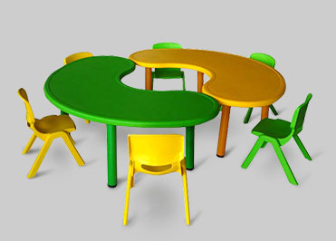 Bean shaped table with 6 chairs for the preschollers in yellow and green color