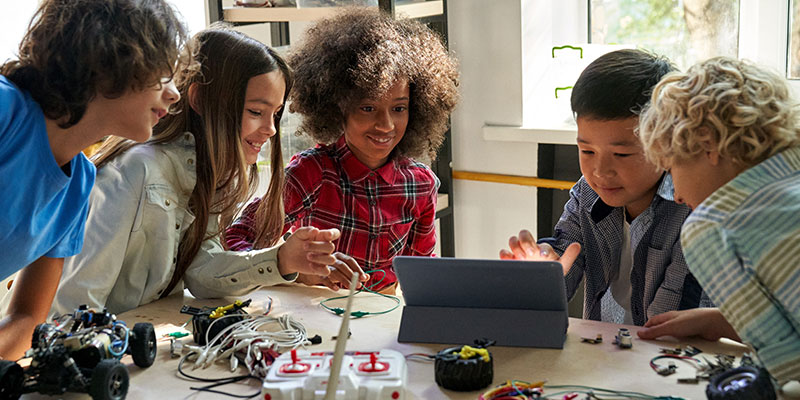 Happy group of children with STEM activity