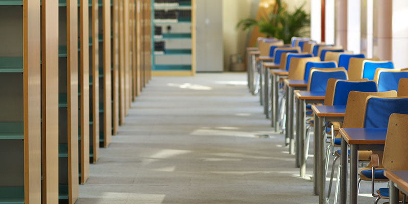 A college library interior illustrates the key factors in choosing library furniture.
