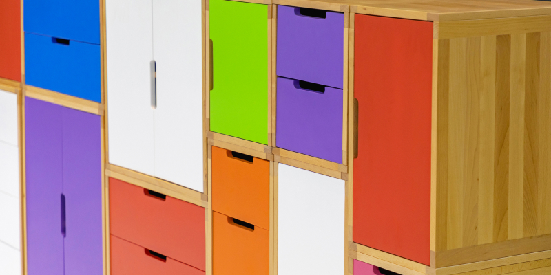 A colourful storage cabinet in childrens' classroom.
